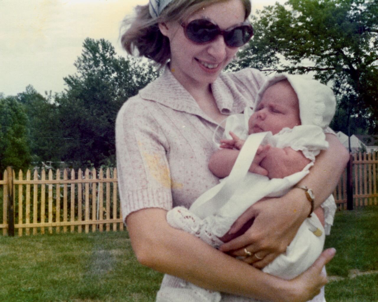 A young Katie with her newborn daughter
