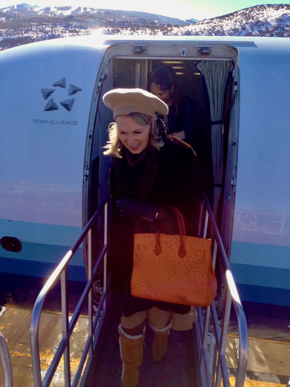 Katie, ever elegant, on her travels